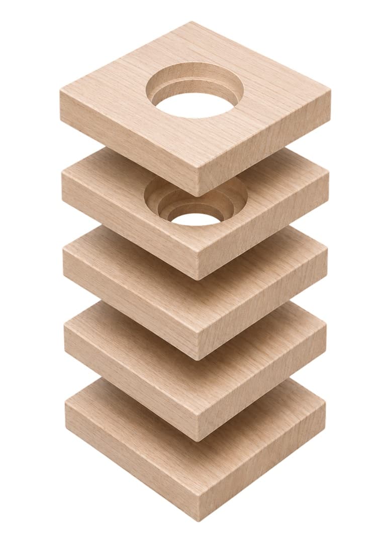 Exploded view of stacked maple slabs, processed and glued.